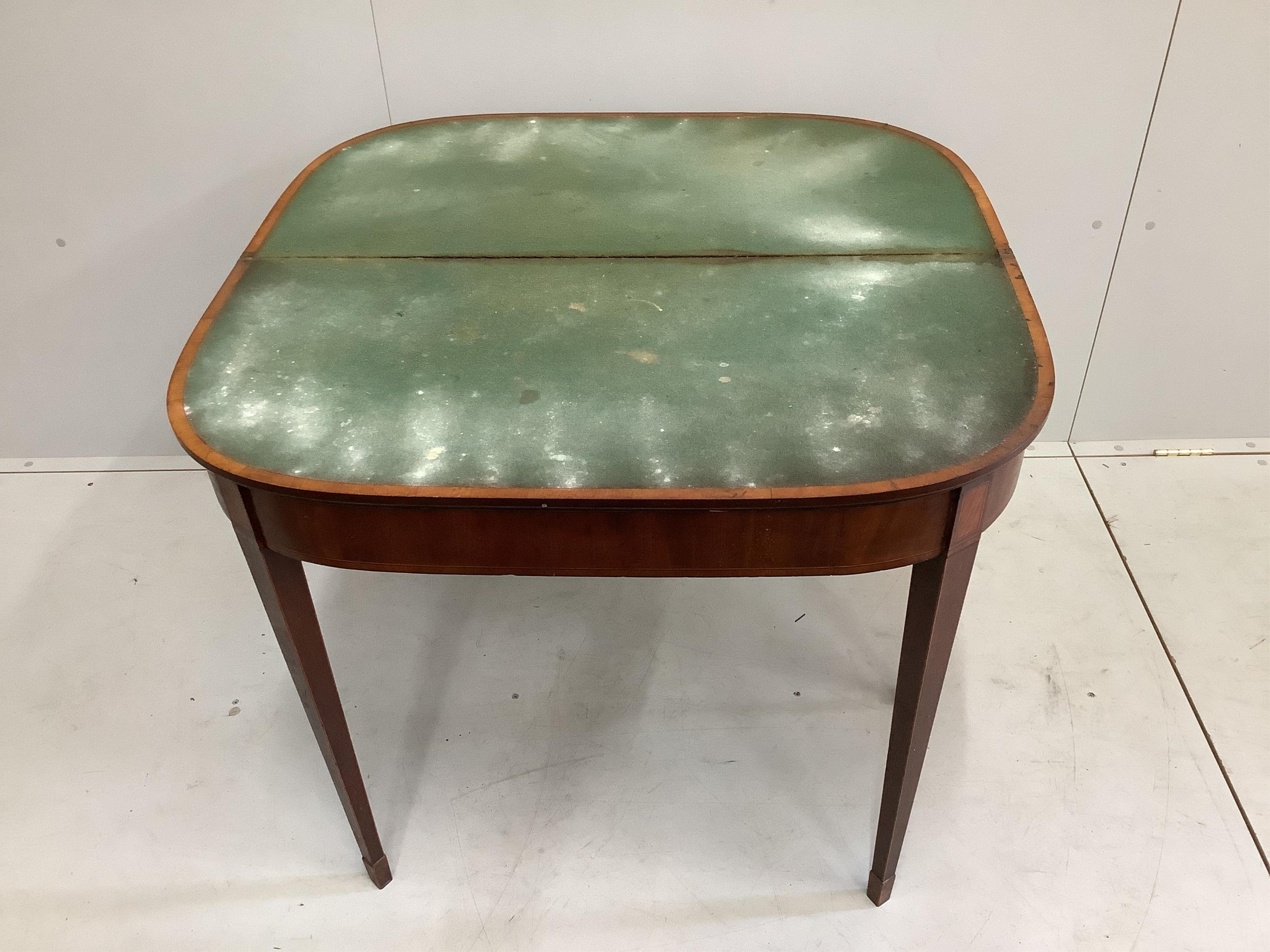 A George III satinwood banded mahogany D shaped folding card table, width 92cm, depth 45cm, height 74cm